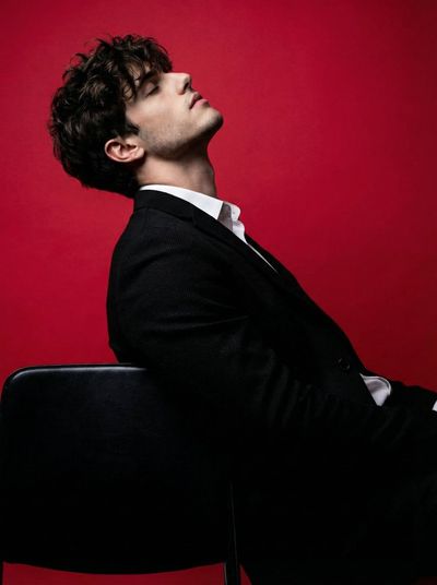 Cinematic Studio Portrait with Crimson Contrast