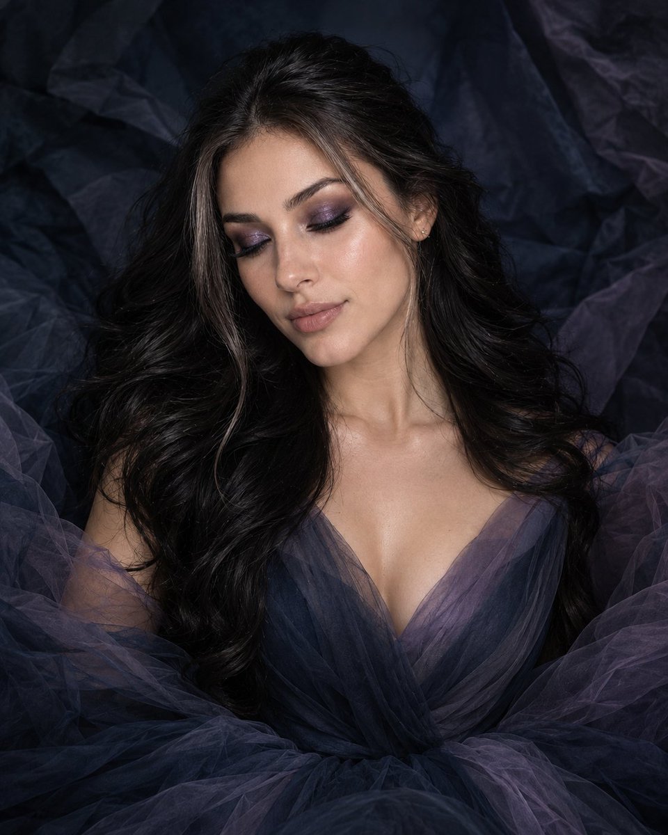 Elegant woman with closed eyes in smoky violet makeup portrait