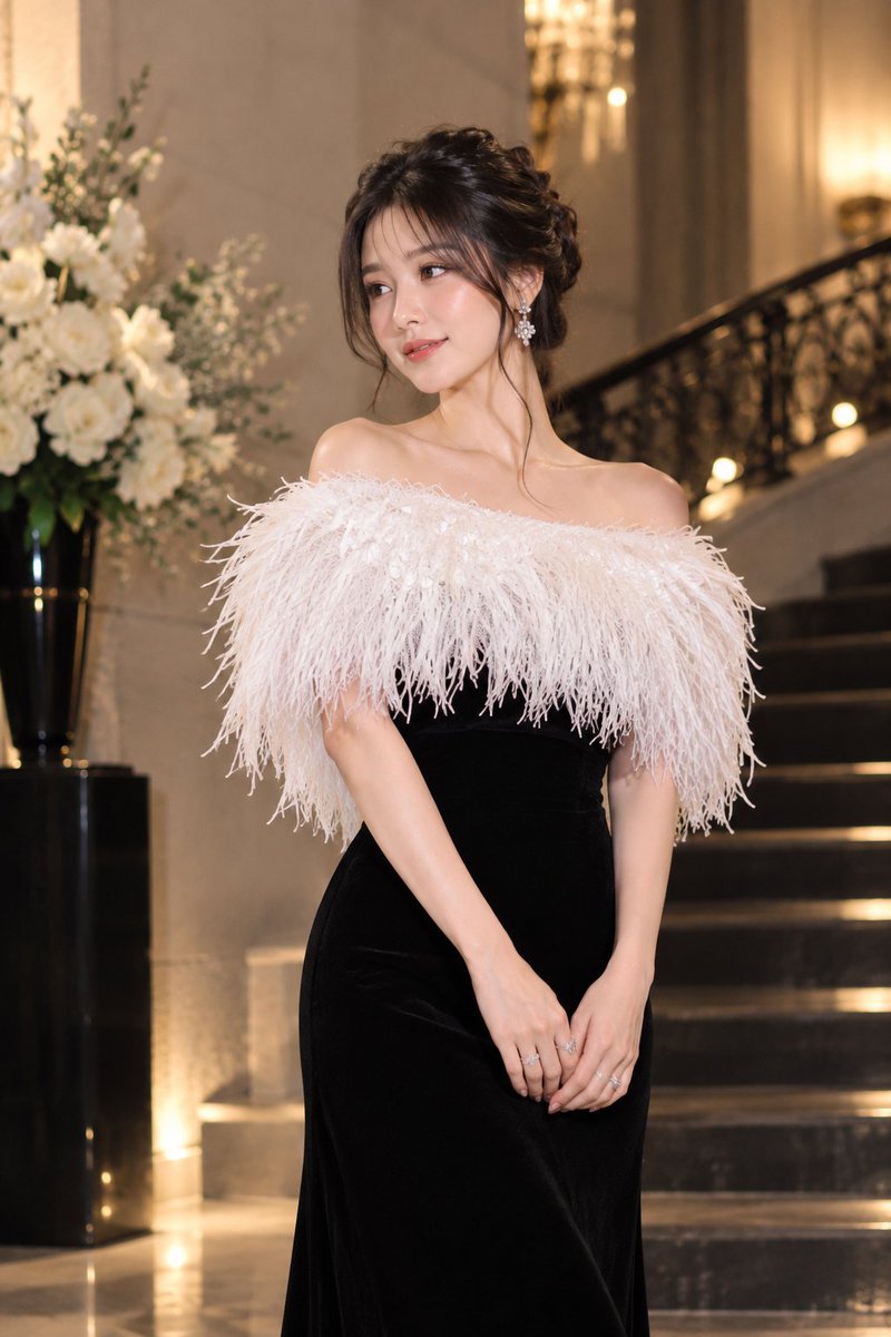 Elegant East Asian Woman Poses in Luxurious Hall with Feather Gown