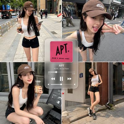 Playful Korean woman poses in urban streets with music player