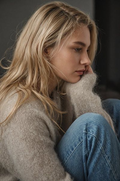 Blonde Woman in Fuzzy Sweater Poses in Cinematic Side Profile