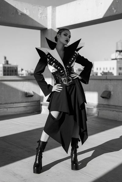 Monochrome Elegance: Avant-Garde Fashion on Concrete Rooftop
