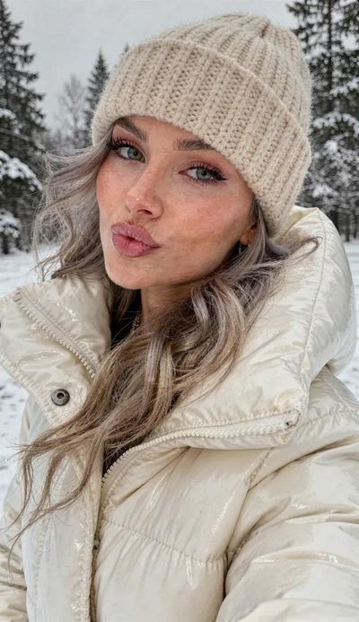 Winter Whispers: A Realistic Selfie Portrait