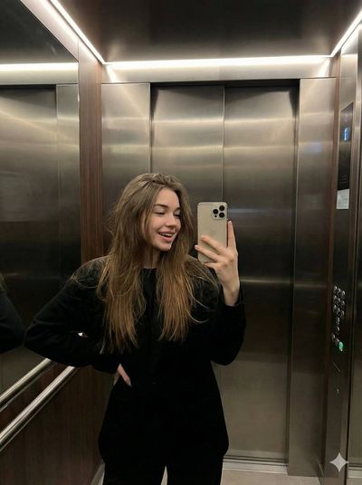 Elevator Vibes: A Mirror Moment