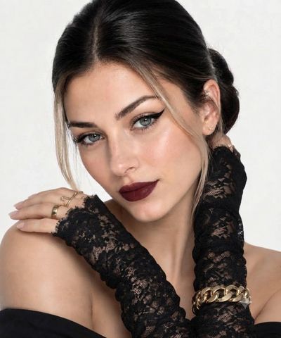 Elegant Beauty Portrait with Black Lace Gloves and Gold Jewelry