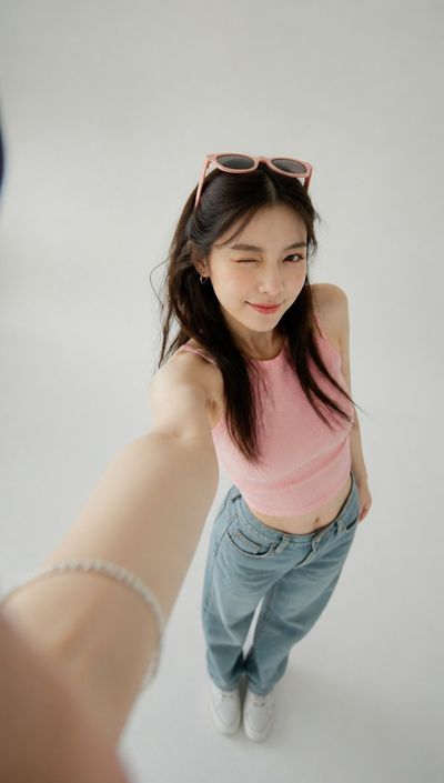 Capturing Playful Confidence: An Ultra-Realistic Selfie Perspective