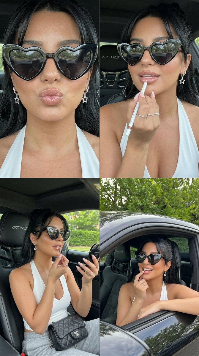 A glamorous woman poses in a Porsche 911 GT3 RS