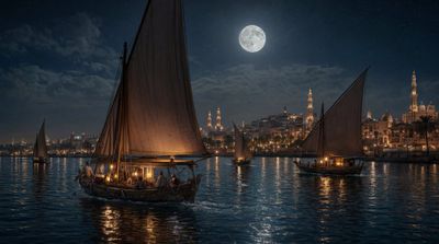 Moonlit feluccas drift on the Nile under Cairo's warm glow.