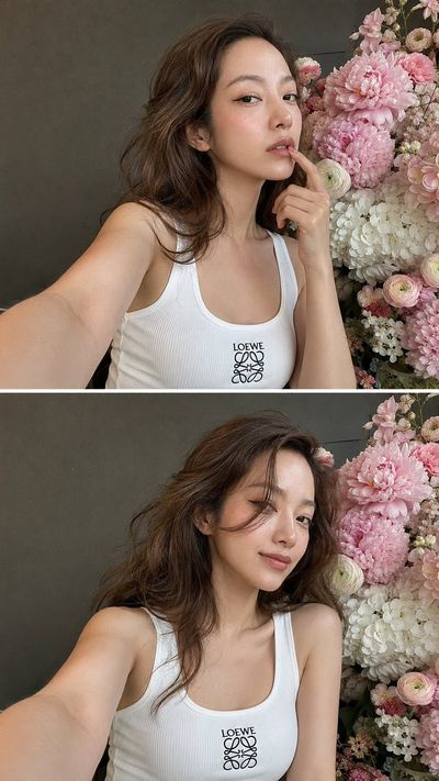 Woman with finger on lip holds flowers in dual selfie
