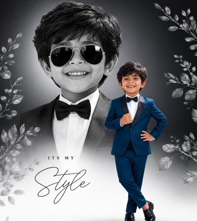 Elegant young boy in royal blue tuxedo poses with monochrome portrait