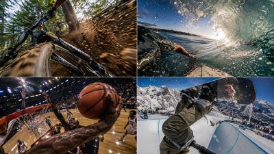 A basketball player leaps for a dunk in a crowded arena