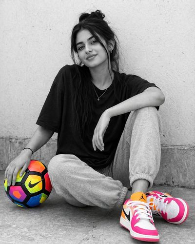 Monochrome Urban Portrait with Vibrant Color Accents