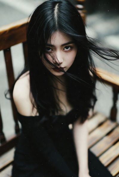 Faded Memories: East Asian Girl in Vintage Mobile Lens