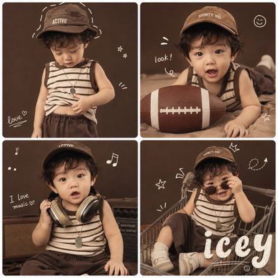 Toddler explores vintage sporty scrapbook collage with warm brown tones
