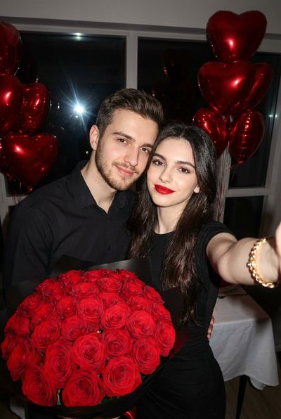 Romantic Selfie in a Bouquet of Roses and Heart Balloons