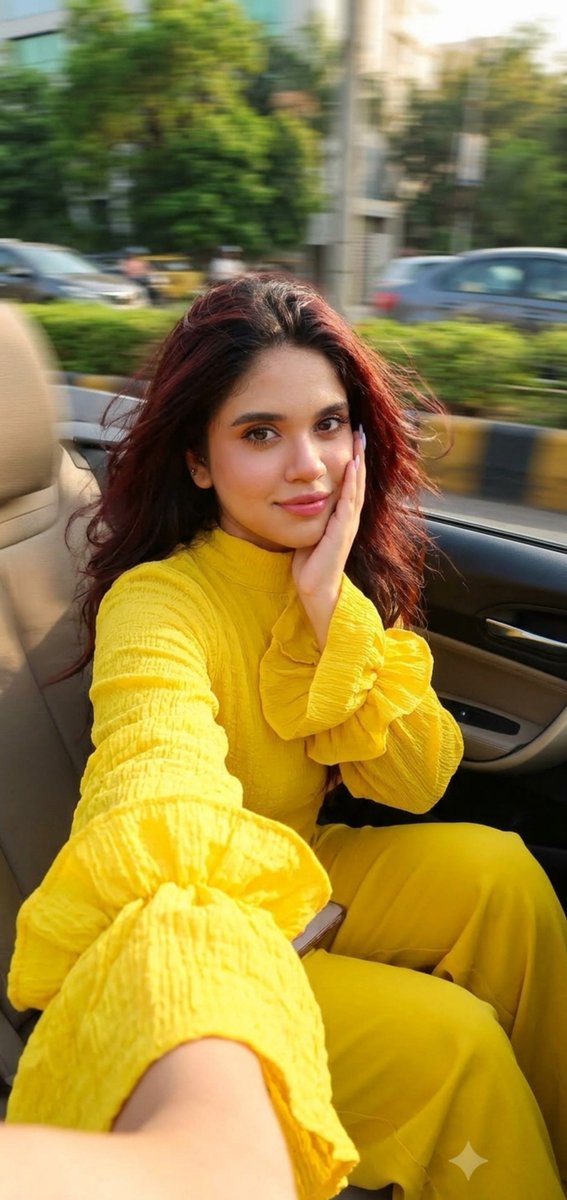 Sunlit Selfie in Convertible: Woman with Yellow Ruffled Sleeves