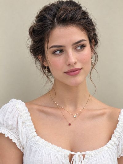 Serene portrait of a young woman with hazel-green eyes in warm light