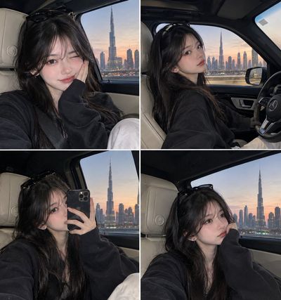 Korean Woman Poses in Mercedes with Dubai Skyline at Sunset