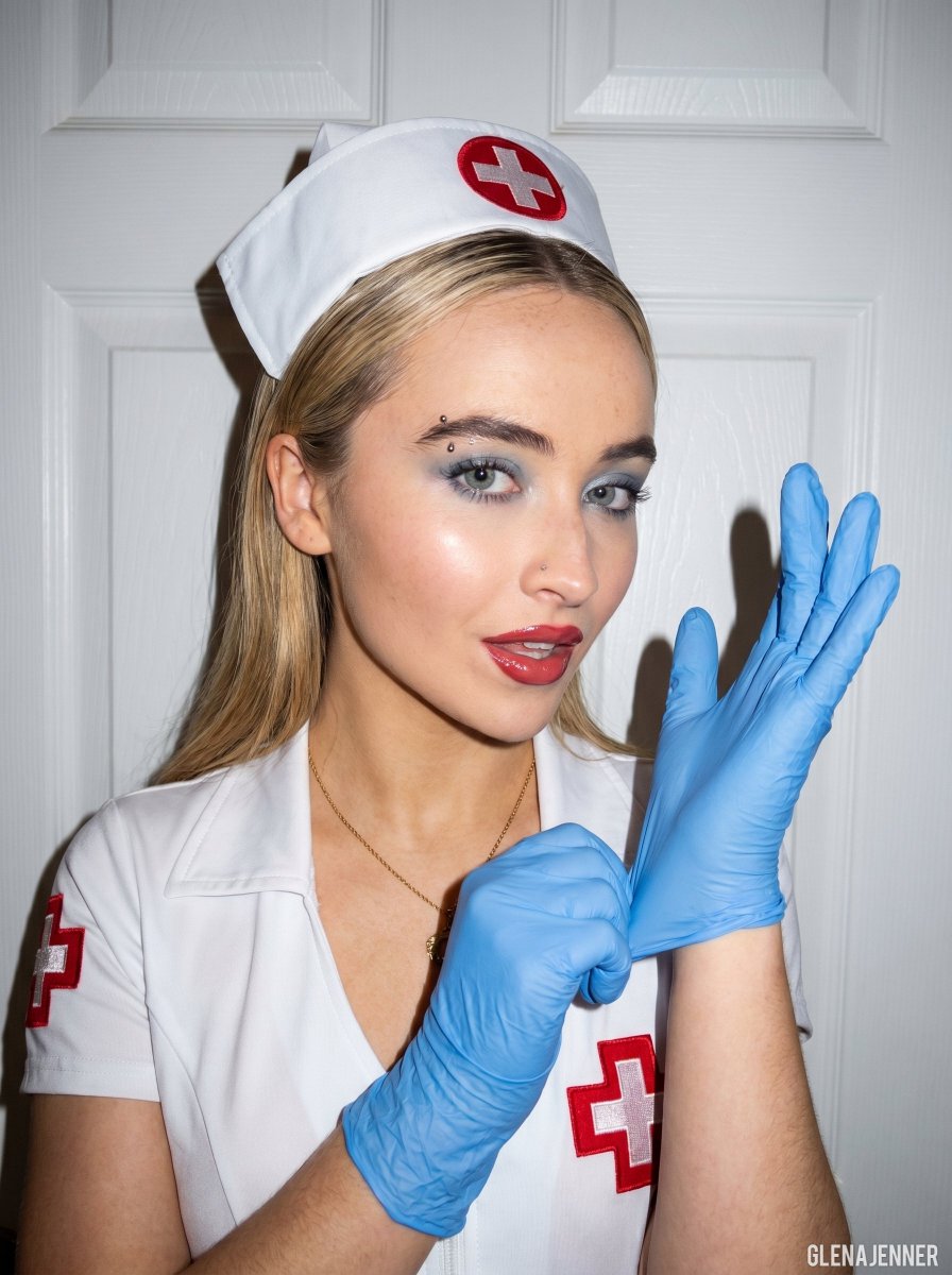 A playful nurse pulls on a blue glove with confidence