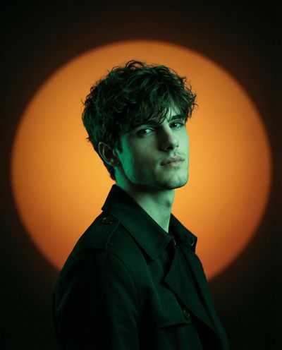 Cinematic Fashion Portrait with Bold Lighting and Minimalist Elegance