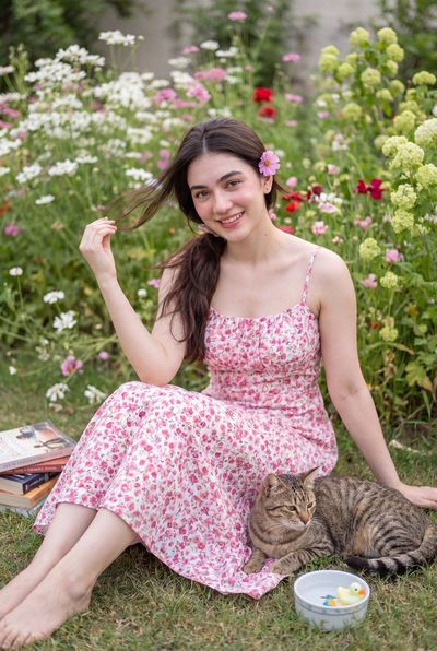 Whimsical Garden Portrait with Soft Feminine Charm