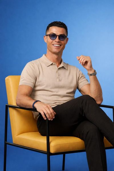 Precise Photorealistic Portrait on Minimalist Yellow Chair