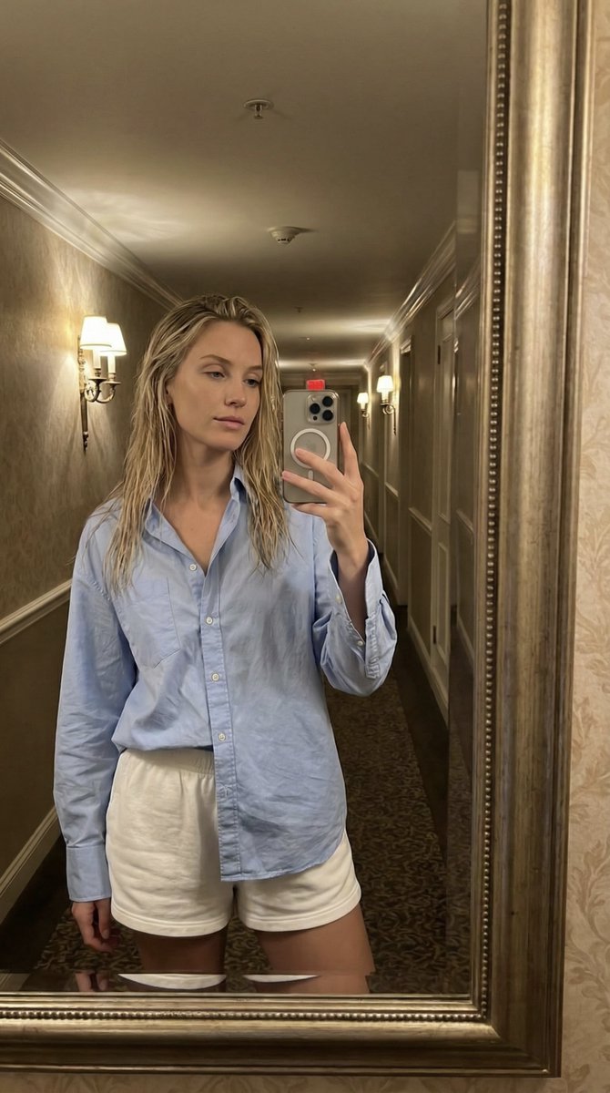 Nighttime Mirror Selfie in Hotel Hallway