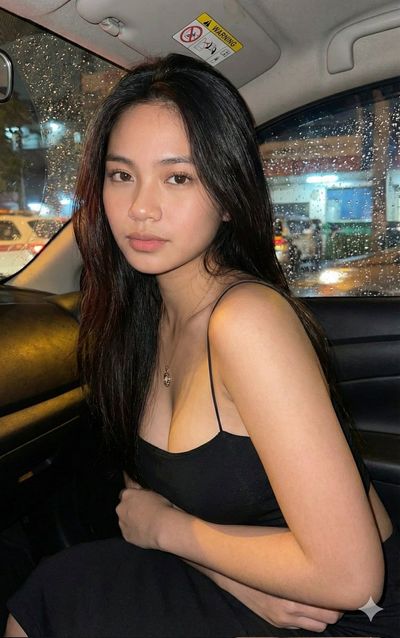 Rainy Night Reflections: A Candid Portrait
