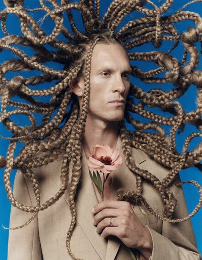 Intricate Braided Hairstyles in Bold Editorial Portrait