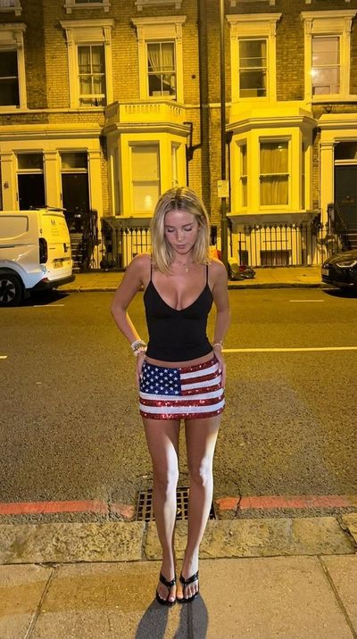 Urban Night Portrait Featuring Bold American Flag Micro-Mini Skirt