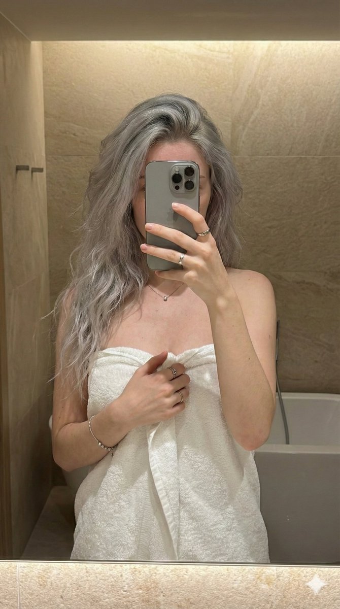 Reflective Radiance: A Bathroom Selfie Story