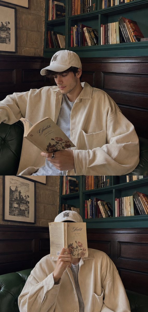 A young man reads poetry in a cozy teal-green cafe