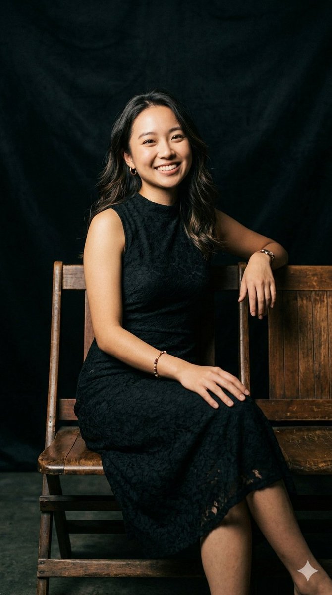 Elegant woman smiles warmly on vintage wooden bench