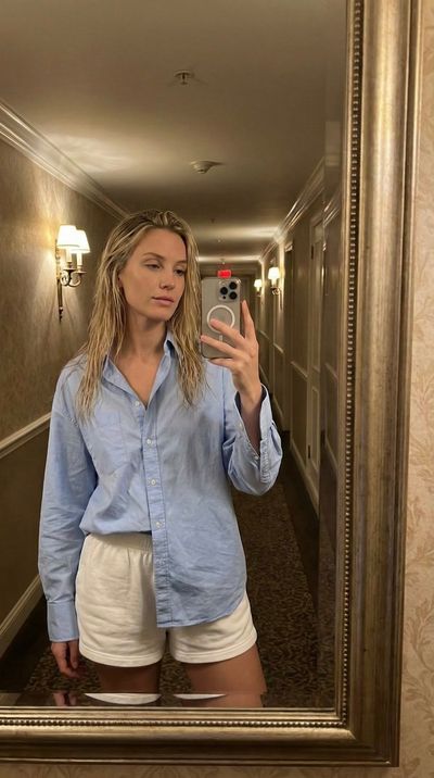 Nighttime Mirror Selfie in Hotel Hallway