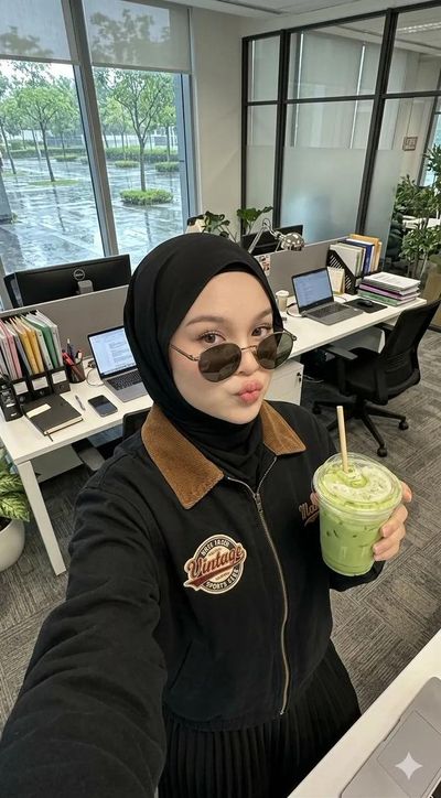 Playful Office Selfie with a Matcha Latte