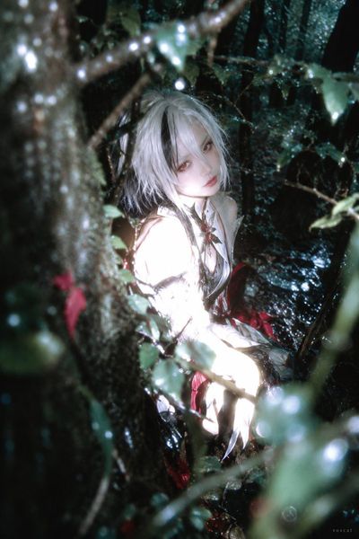 Close Flash Overexposes a Figure Turning Inside a Deep Green Forest