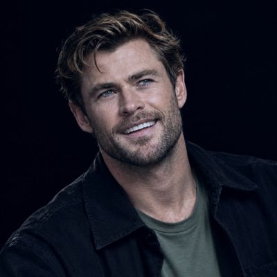 Candid Laughing Man Portrait on Deep Black Background