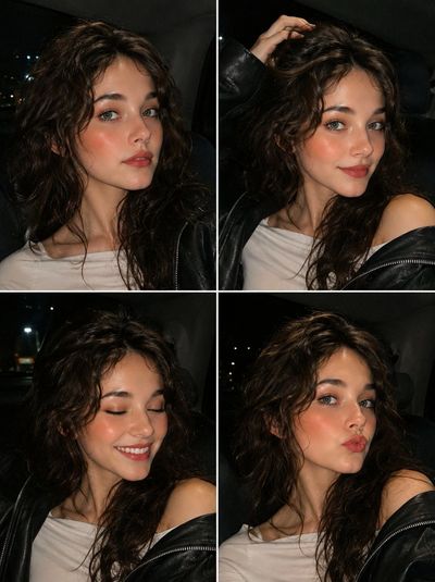 Young woman in leather jacket takes flash selfie in dark car