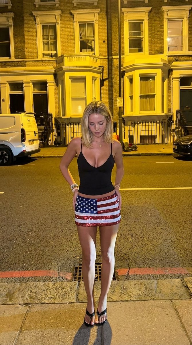 Urban Night Portrait Featuring Bold American Flag Micro-Mini Skirt