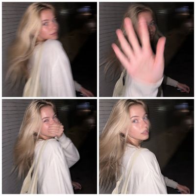 A surprised woman turns back while walking on a dark Tokyo street