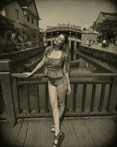 Vintage 1970s black-and-white photograph with organic grain and sepia tint