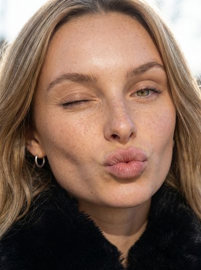 Wink and Pucker: A Flirtatious Close-Up