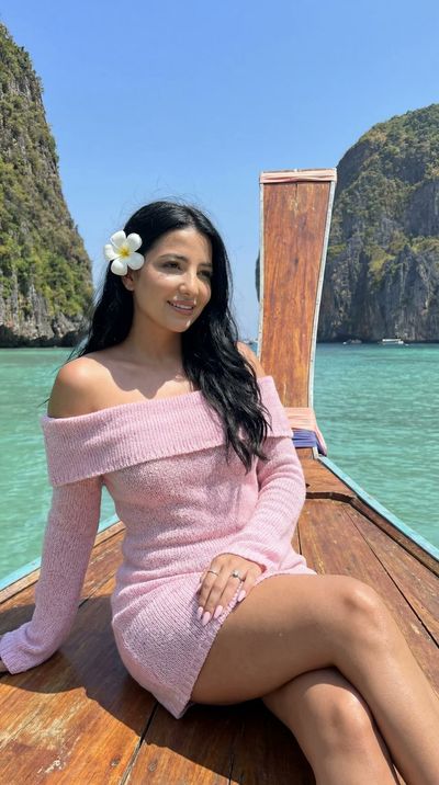 Tropical Serenity: Portrait on a Longtail Boat