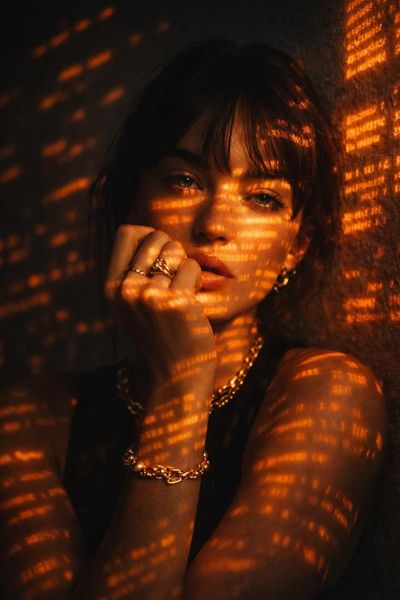 Futuristic Portrait: A Woman Bathed in Glowing Text Light