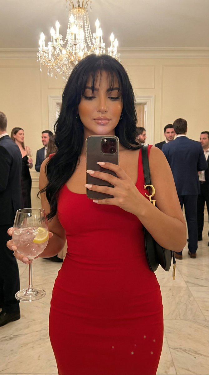 Elegant Mirror Selfie in Golden Party Glow