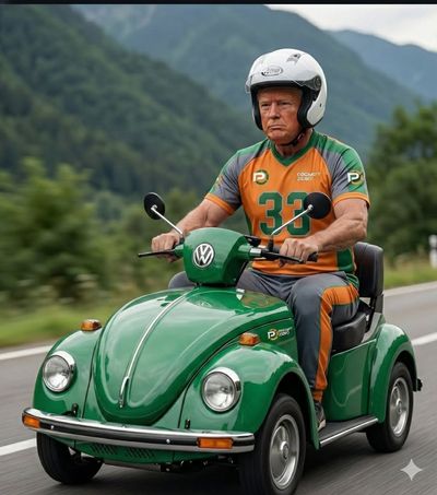 Volkswagen Beetle-Inspired Scooter Ride Through Misty Mountains