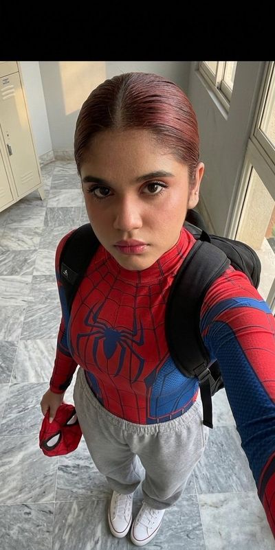 A student hides her superhero identity in plain sight