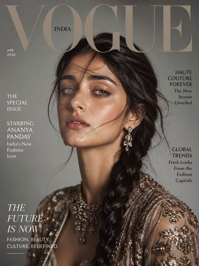 Dark-haired beauty poses in haute couture for Vogue cover