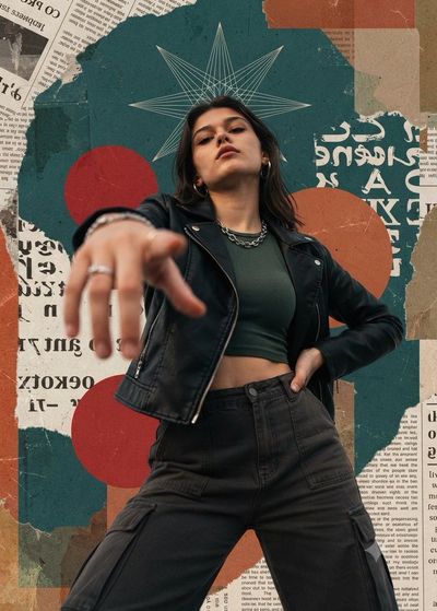 Young woman in leather jacket creates bold mixed-media collage scene
