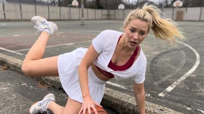 Scandinavian basketball player falls awkwardly onto the net during game